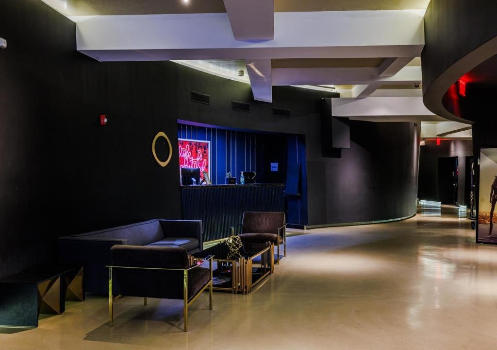 Lounge with neon lights and chairs