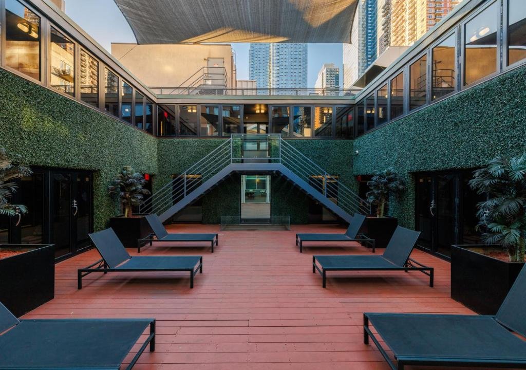 Courtyard with seating and glass walls