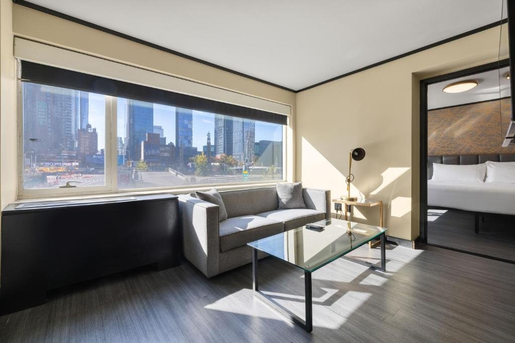 Room with city view and desk