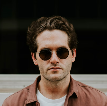 a man in black glasses